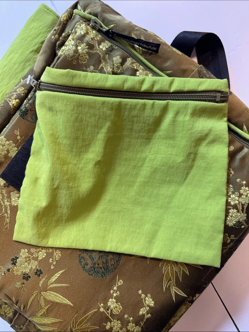 Petunia Pickle Bottom olive and lime floral crossbody diaperbag